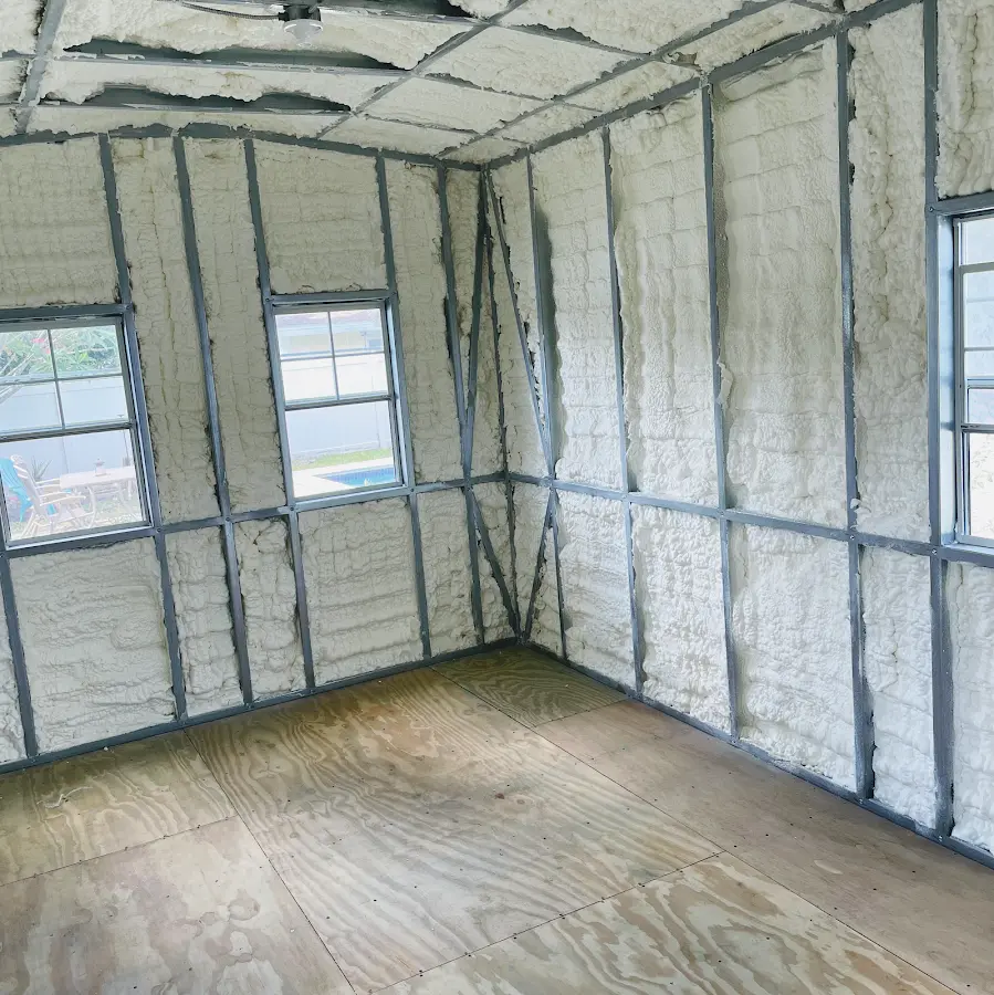 Closed-cell spray foam insulation applied to wall cavities in a residential project in Round Lake